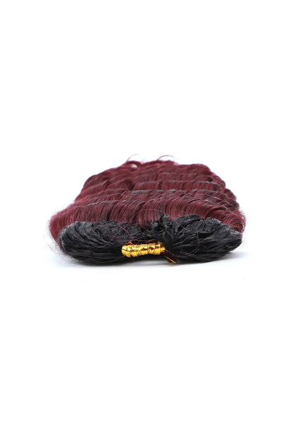 Detail of the ends of T1B/Burgundy 99J deep wave feather crochet human hair